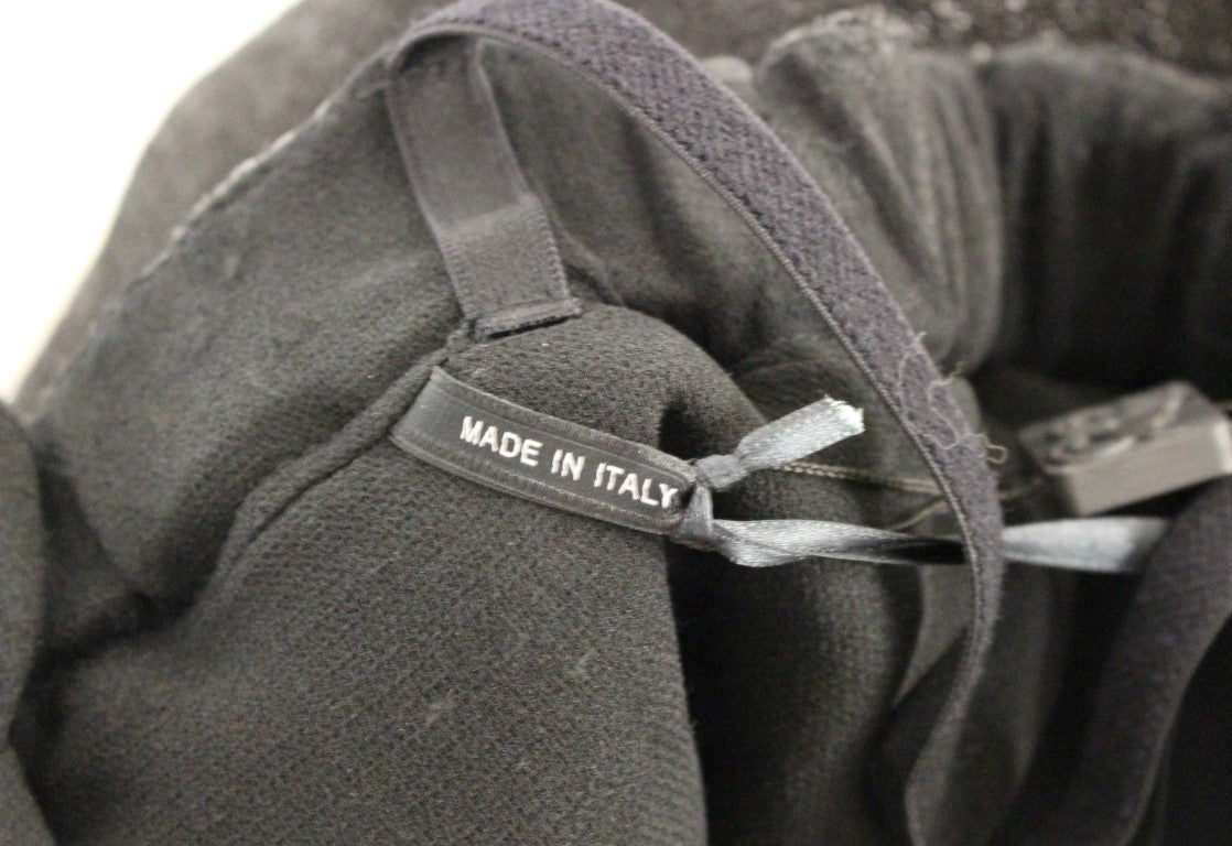 La Maison du Couturier Elegant Sort Læderjumpsuit med Taljerem
