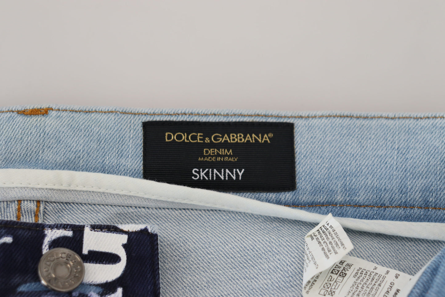 Dolce & Gabbana Elegant Crown Print Denimbukser