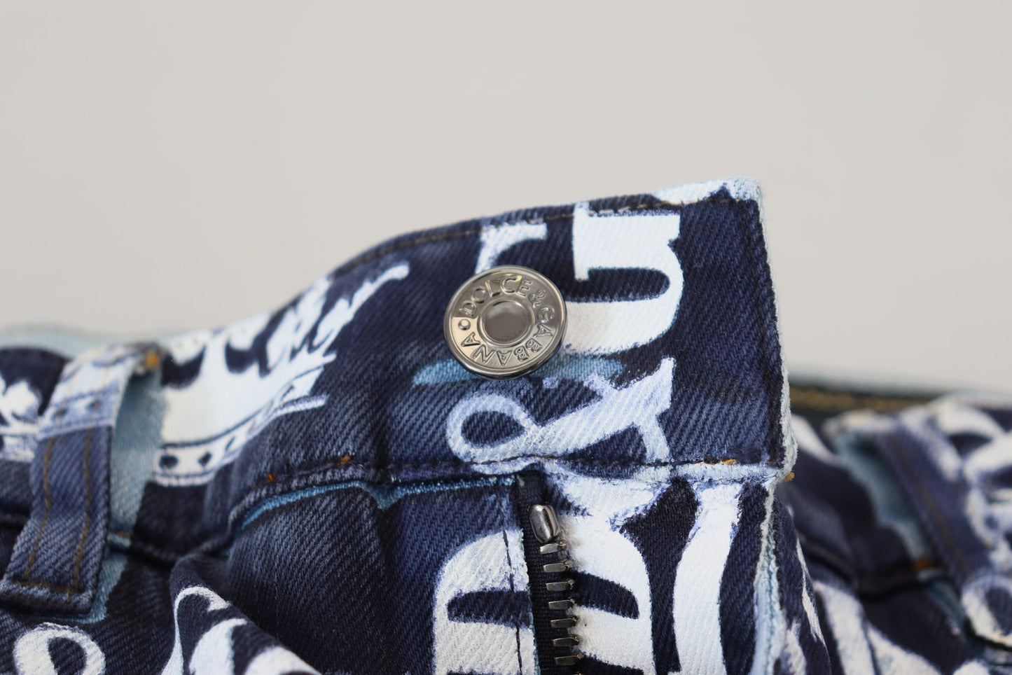Dolce & Gabbana Elegant Crown Print Denimbukser