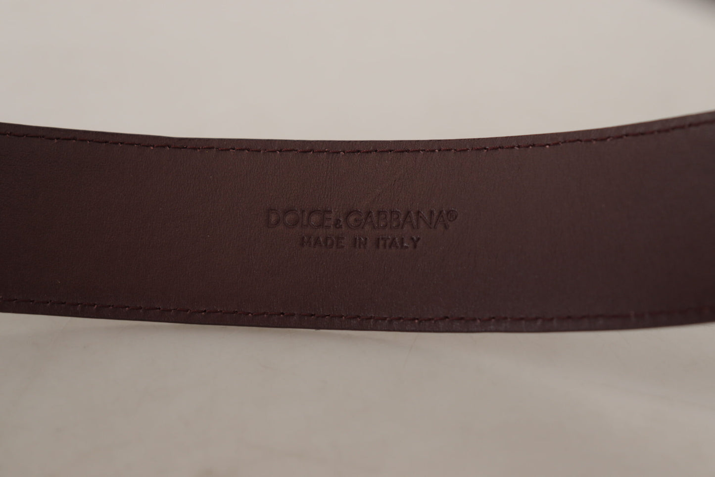 Dolce & Gabbana Elegant Kastanjebrun Læderbælte med Graveret Spænde