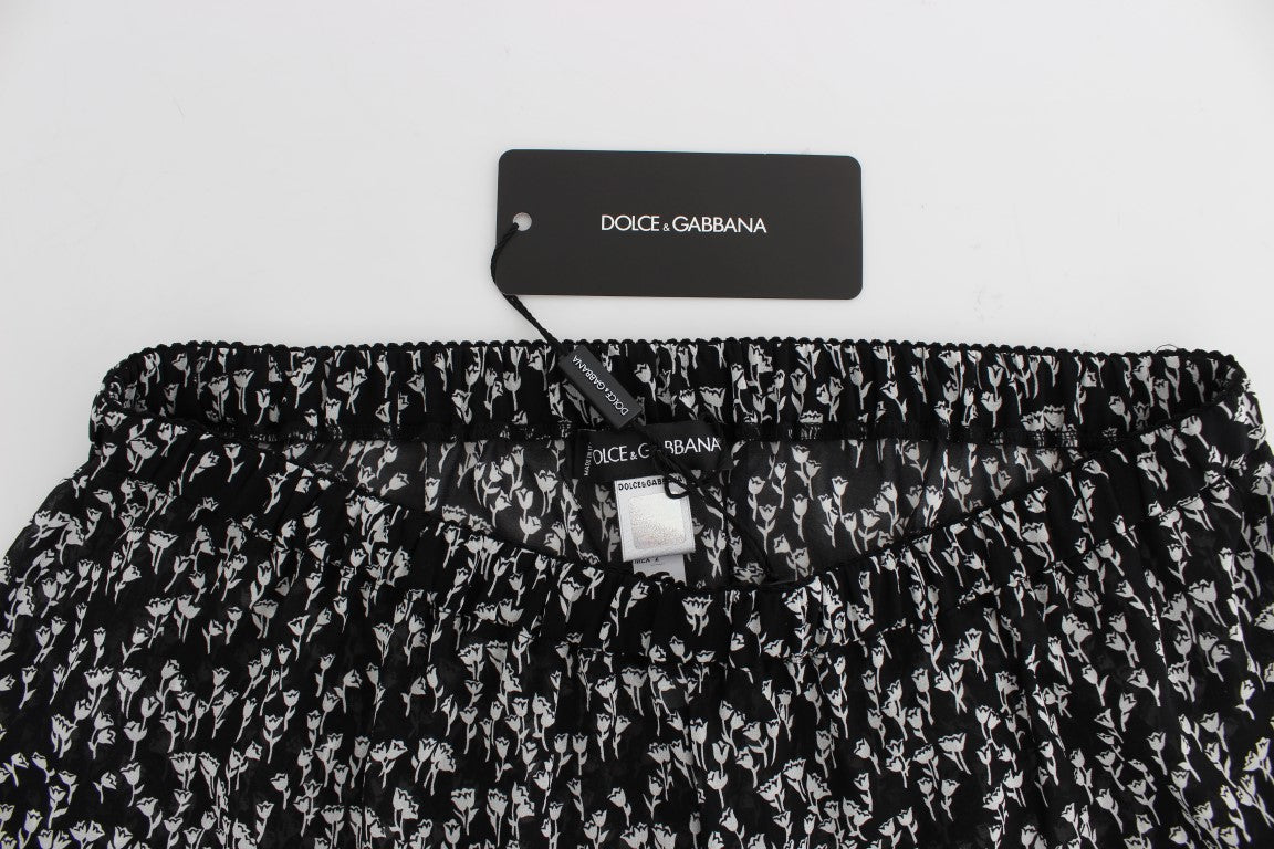 Dolce &amp; Gabbana elegante sorte og hvide blomstrede silkeshorts