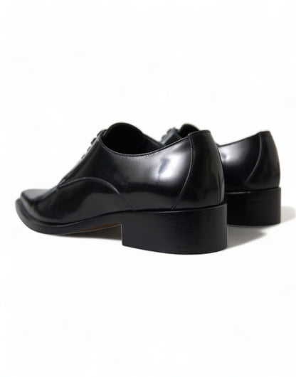 Dolce &amp; Gabbana Elegante Sorte Læder Formelle Flade Sko